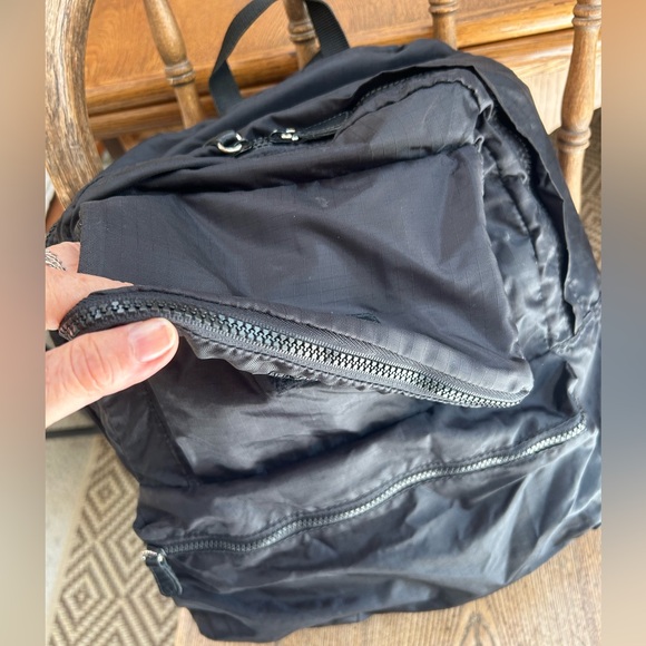 Wilson’s Leather Black nylon backpack, folds/compress out of sight. Ex condition - Picture 2 of 8